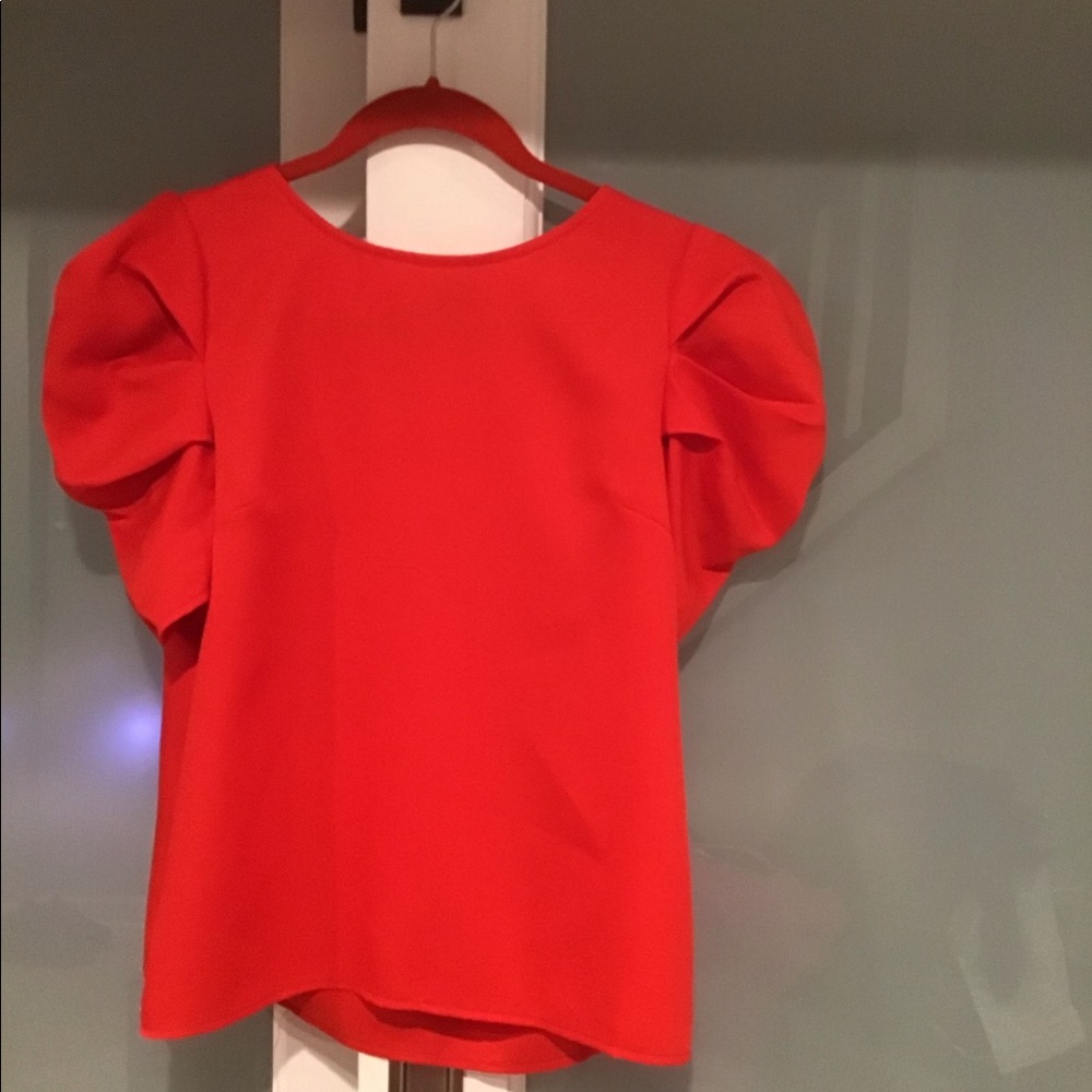 New without Tags red/orange puff sleeve blouse.